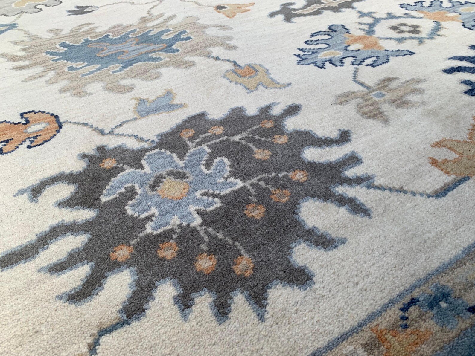 Detail view 2 of Oushak Ivory and Blue Floral Rug 8ft x 10ft